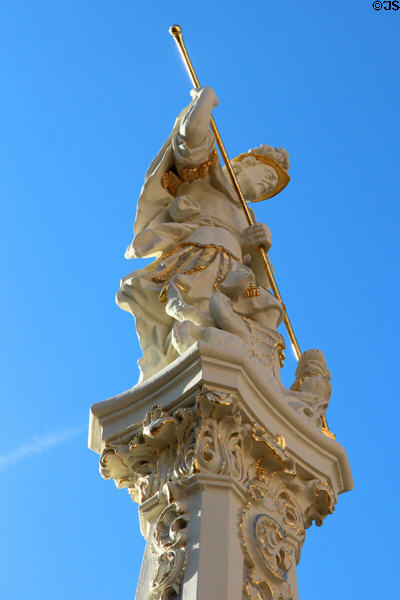 Figure of St George slaying the dragon atop St George's Fountain on Kornmarkt. Trier, Germany.