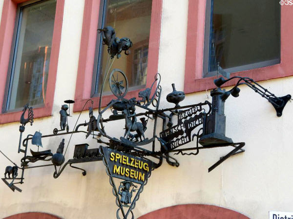 Shop sign for Trier Toy Museum. Trier, Germany.