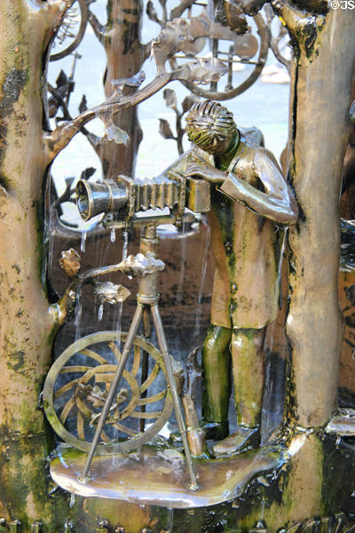 Craftsmen's Fountain detail depicting photographer using his camera. Trier, Germany.