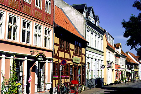 The many varied faces of buildings in the Odense street scene. Denmark.