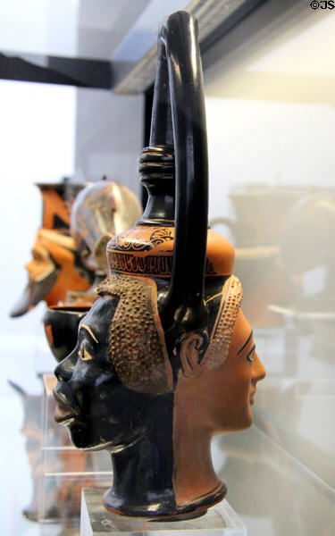 Greek terracotta wine vessel with face of woman on one side & face of an African on the other (c490-480 BCE) at Antikensammlungen. Munich, Germany.