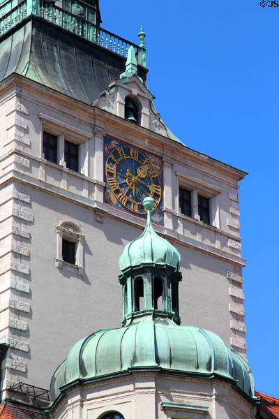 Clock tower details of Bavarian National Museum. Munich, Germany.