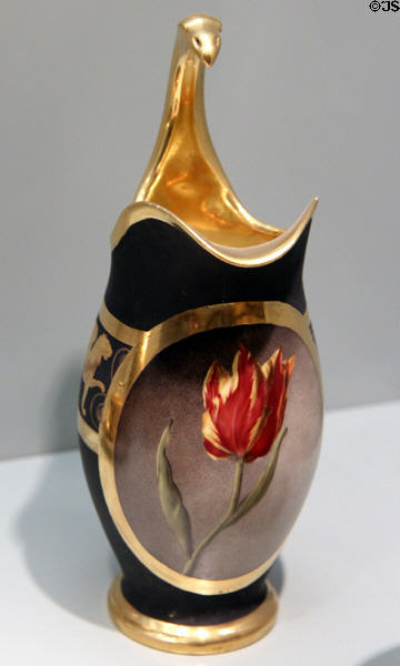 Porcelain pitcher painted with flowers on black (c1815) by Nymphenburg copies at Bavarian National Museum. Munich, Germany.