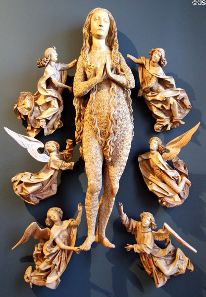 St Magdalena raised by angels wood carving from high altar of Münnerstadt (1490-2) by Tilman Riemenschneider at Bavarian National Museum. Munich, Germany.