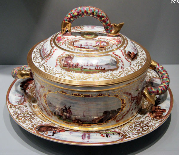 Meissen porcelain fish-handle tureen with oriental buying-trip painted scenes (c1730) at Bavarian National Museum. Munich, Germany.