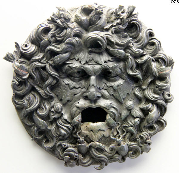 Bronze fountain mask of Roman god oceanus with marine animals in his hair at Bavarian State Archaeological Collection. Munich, Germany.
