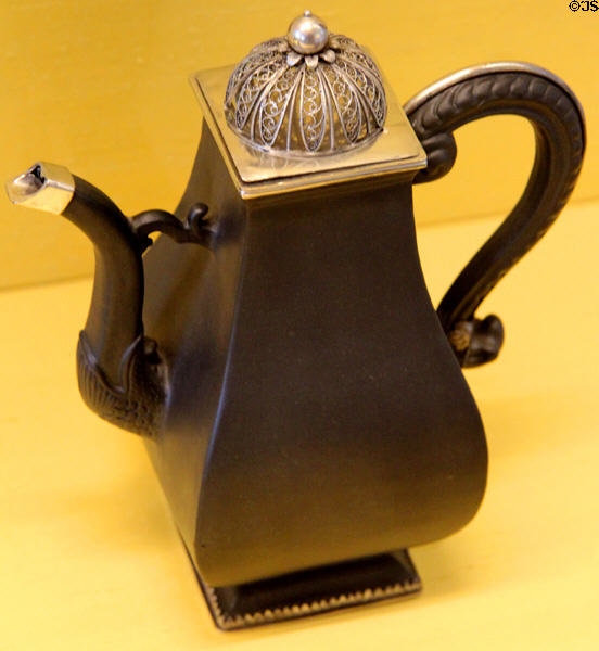 Meissen iron porcelain (aka steinzeug) coffeepot with silver filigree lid (c1710-15) at Meissen porcelain museum at Lustheim Palace. Munich, Germany.
