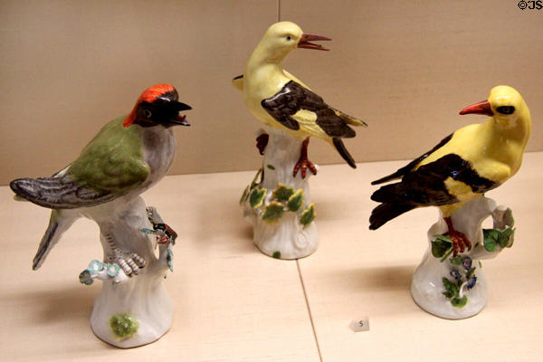 Meissen porcelain oriole figures (1733-4 or 1740-7) by Johann Joachim Kaendler or Johann Gottlieb Ehder at Meissen porcelain museum at Lustheim Palace. Munich, Germany.