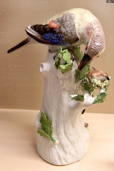 Meissen porcelain bird figure tending nestling at Meissen porcelain museum at Lustheim Palace. Munich, Germany.