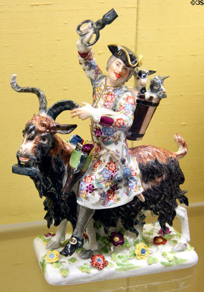 Meissen porcelain figure mocking tailor of Count Brühl on billy goat (1740) by Johann Joachim Kaendler at Meissen porcelain museum at Lustheim Palace. Munich, Germany.