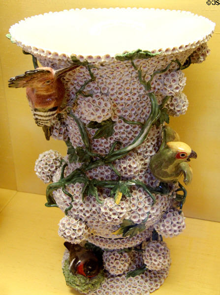 Meissen porcelain snowball style vase with hoopoe, parrot & bullfinch on its nest (c1750) at Meissen porcelain museum at Lustheim Palace. Munich, Germany.