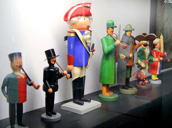 German carved figures in antique dress at folk art Collection Gertrud Weinhold. Munich, Germany.