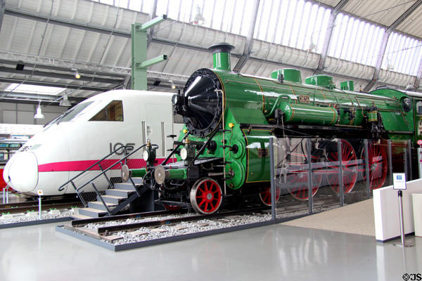 Modern ICE front end unit & express passenger steam locomotive S3/6 (1812) at Deutsches Museum Transport Museum. Munich, Germany.