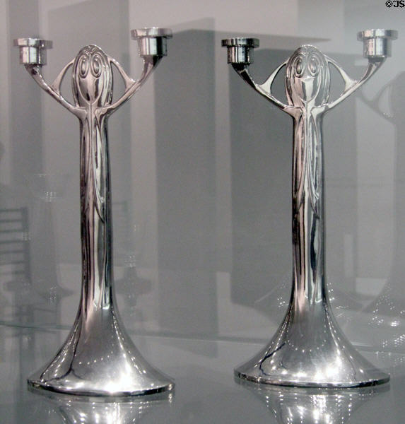Polished tin candlesticks (c1901) by Joseph Maria Olbrich for Eduard Hueck KG. of Lüdenscheid at Pinakothek der Moderne. Munich, Germany.