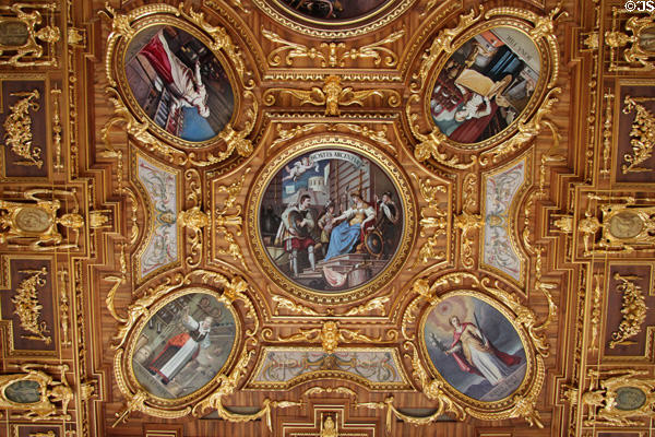 Paintings in gilded oval frames on ceiling in Goldener Saal at Augsburg Rathaus. Augsburg, Germany.