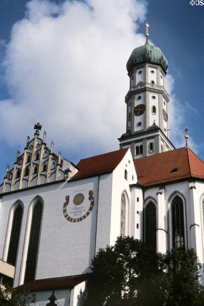Basilica of Sts. Ulrich & Afra with sundial saying "works as long as it is day". Augsburg, Germany. Style: Gothic with Baroque tower.