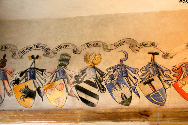Murals with shields of various families at Bamberg City Museum. Bamberg, Germany.