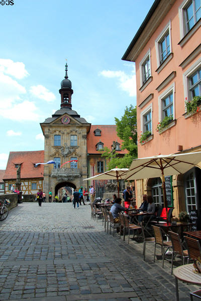 Bridge approach to Bamberg Old Town Hall from east showing clock tower over open passage through tower. Bamberg, Germany.