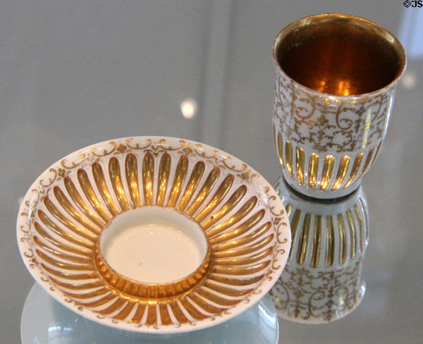 Meissen porcelain chocolate cup with gold decor (c1720) at Bamberg Old Town Hall Museum of Faience & Porcelain. Bamberg, Germany.