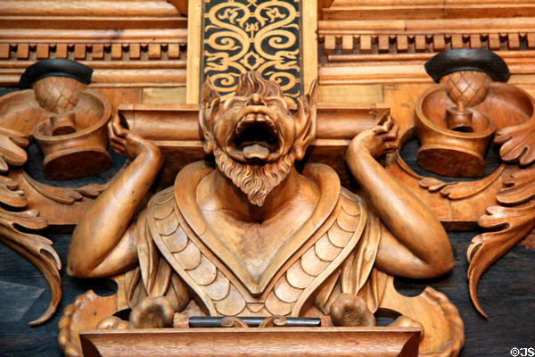 Grotesque figure carved in Intarsia Hunting Room at Coburg Castle. Coburg, Germany.