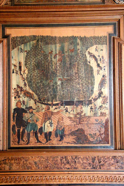 Detail of Intarsia wood mosaics panel of men is 16thC dress preparing hunting net (before 1633) by Wolfgang Birkner in Intarsia Hunting Room at Coburg Castle. Coburg, Germany.