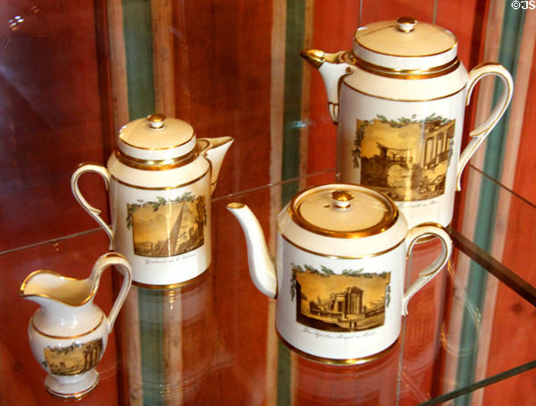 Porcelain pieces from coffee & tea service painted with scenes of temples & ruins (c1800) from Gotha at Coburg Castle. Coburg, Germany.