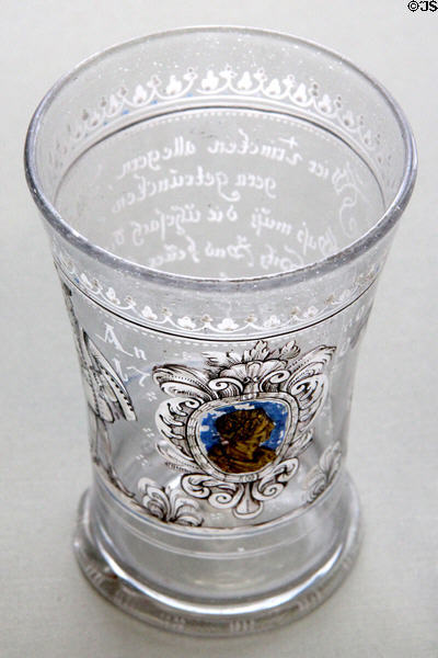 Glass beaker with bronze profile of Roman emperor (1707) from Saxony at Coburg Castle. Coburg, Germany.