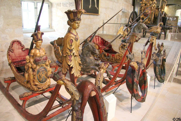 Carved horse-drawn racing snow sled with Indian (c1723) & other themes at Coburg Castle. Coburg, Germany.