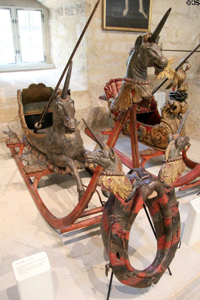 Carved horse-drawn racing snow sled with Unicorn (c1700) theme at Coburg Castle. Coburg, Germany.