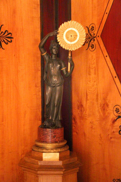 Bronze clock in form of sunflower held by female figure (prior to 1819) by Gerard-Jean Galle of Paris at Ehrenburg Palace. Coburg, Germany.