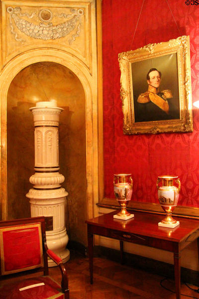 Tile stove in niche beside porcelain vases (1820-30) from Berlin at Ehrenburg Palace. Coburg, Germany.