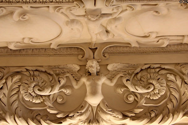 Winged creatures on Baroque sculpted hall ceiling (1674) at Fembohaus City Museum. Nuremberg, Germany.