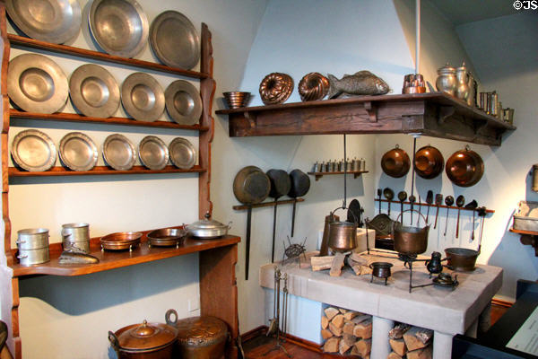 Cooking fireplace & vessels in copper & pewter at Fembohaus City Museum. Nuremberg, Germany.