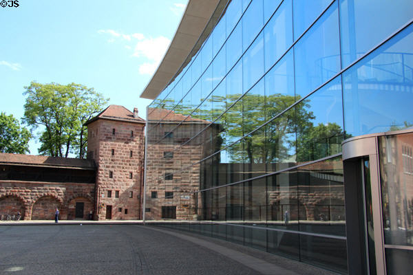 Neues Museum Nürnberg (New Museum Nuremberg) (2000) reflects section of city wall at Frauentor. Nuremberg, Germany. Architect: Volker Staab.
