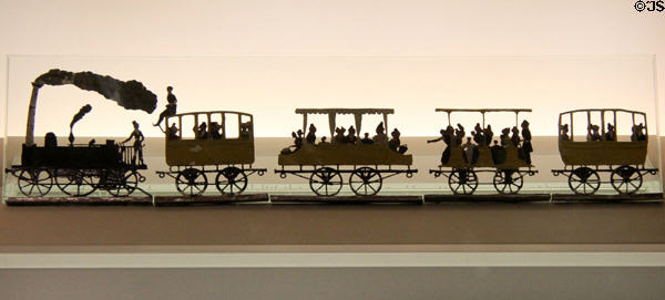 Cast tin toy model of first German train (1835) pulled by locomotive Adler at Nuremberg Transport Museum. Nuremberg, Germany.
