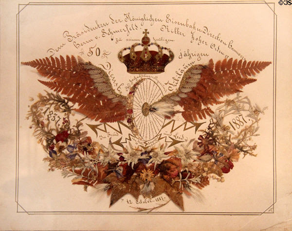Certificate of Appreciation for 50 years of railroad service (1887) at Nuremberg Transport Museum. Nuremberg, Germany.