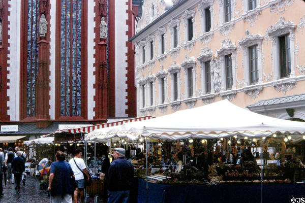 Busy market square with Marienkapelle (Mary's Chapel) in the background. Würzburg, Germany.
