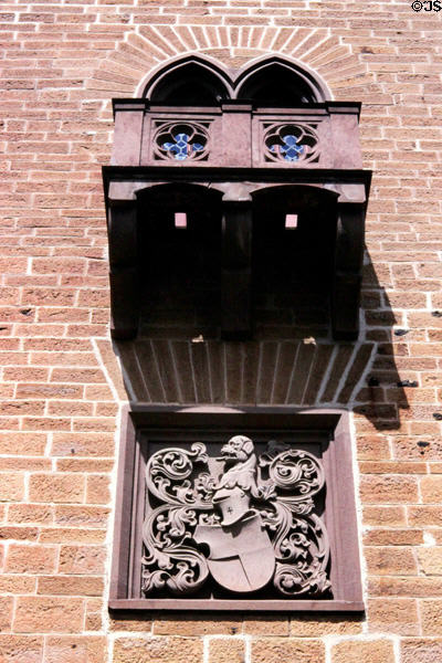 Filigree stone inset into brick wall at Hohenzollern Castle. Germany.