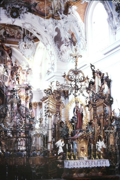 Gothic statue of Virgin Mary & Child (1430) with baroque additions on high altar in Zwiefalten Abbey. Zwiefalten, Germany.