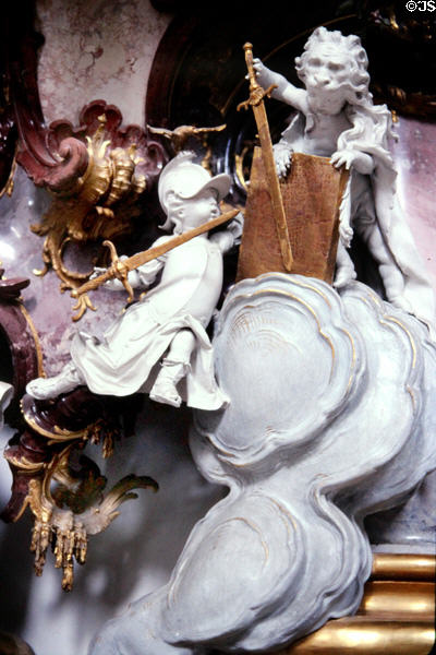 Detail of plasterwork of Nebuchadnezzar battling King Zedekiah of Judah with putti and Lion of Judah holding swords in Zwiefalten Abbey church. Zwiefalten, Germany.