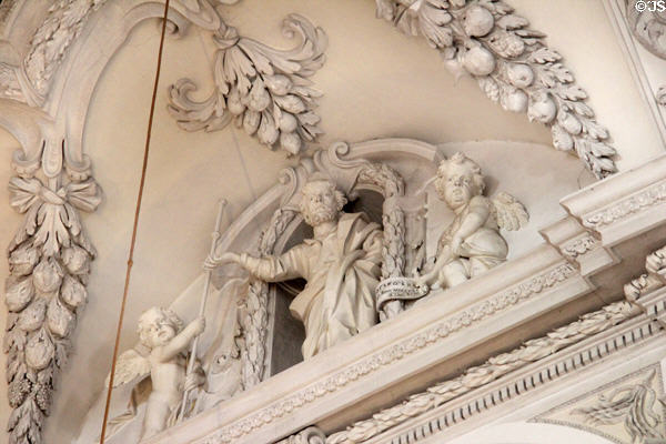 Plasterwork depicting St Benedict, cherubs & garlands in St Benedict church at Benediktbeuern Abbey. Germany.