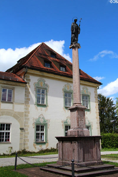 St Leonhard statue marking annual pilgrimage when festively decorated horse-drawn carriages parade from local village to Benediktbeuern Abbey where both pilgrims & horses receive blessings. Germany.