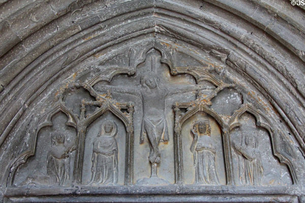 Crucifixion carved in stone on facade of Ettal Benedictine Abbey. Ettal village, Germany.