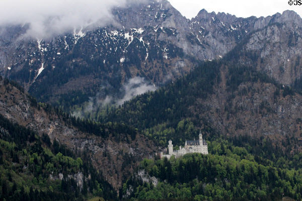 Neuschwanstein Castle located on a rugged cliff among Alps above village of Hohenschwangau near Füssen. Füssen, Germany.