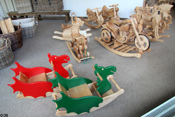 Shop display of various rocking animals & other figures for young children. Füssen, Germany.