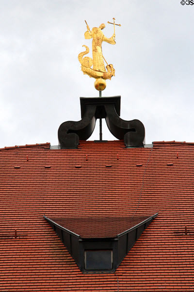 Finial of St Magnus of Füssen slaying a dragon at Basilica St Mang. Füssen, Germany.