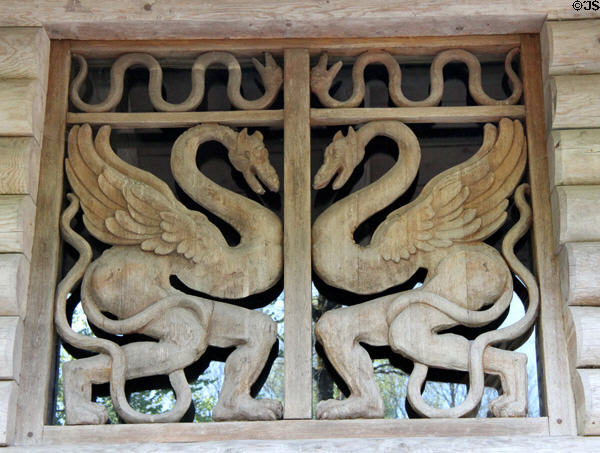 Swan carvings in window frame of Hundings Hut at Linderhof Castle. Ettal, Germany.