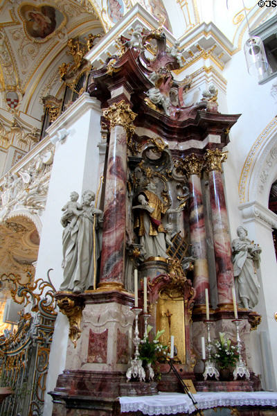 Ornate gilt & marble baroque altar in St Lorenz Basilica. Kempten, Germany.