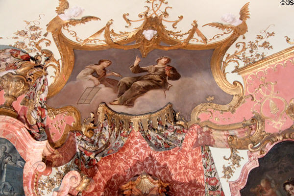 Ceiling painting portraying St. Lawrence with his symbol, the grill on which he was martyred, by Franz Georg Hermann at Kempten Residenz. Kempten, Germany.