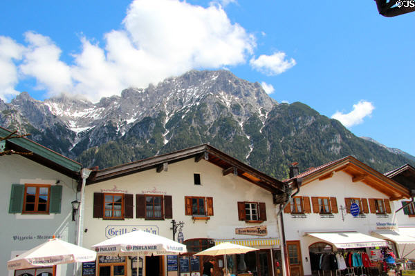 Main street with Alps foothills in the background. Mittenwald, Germany.